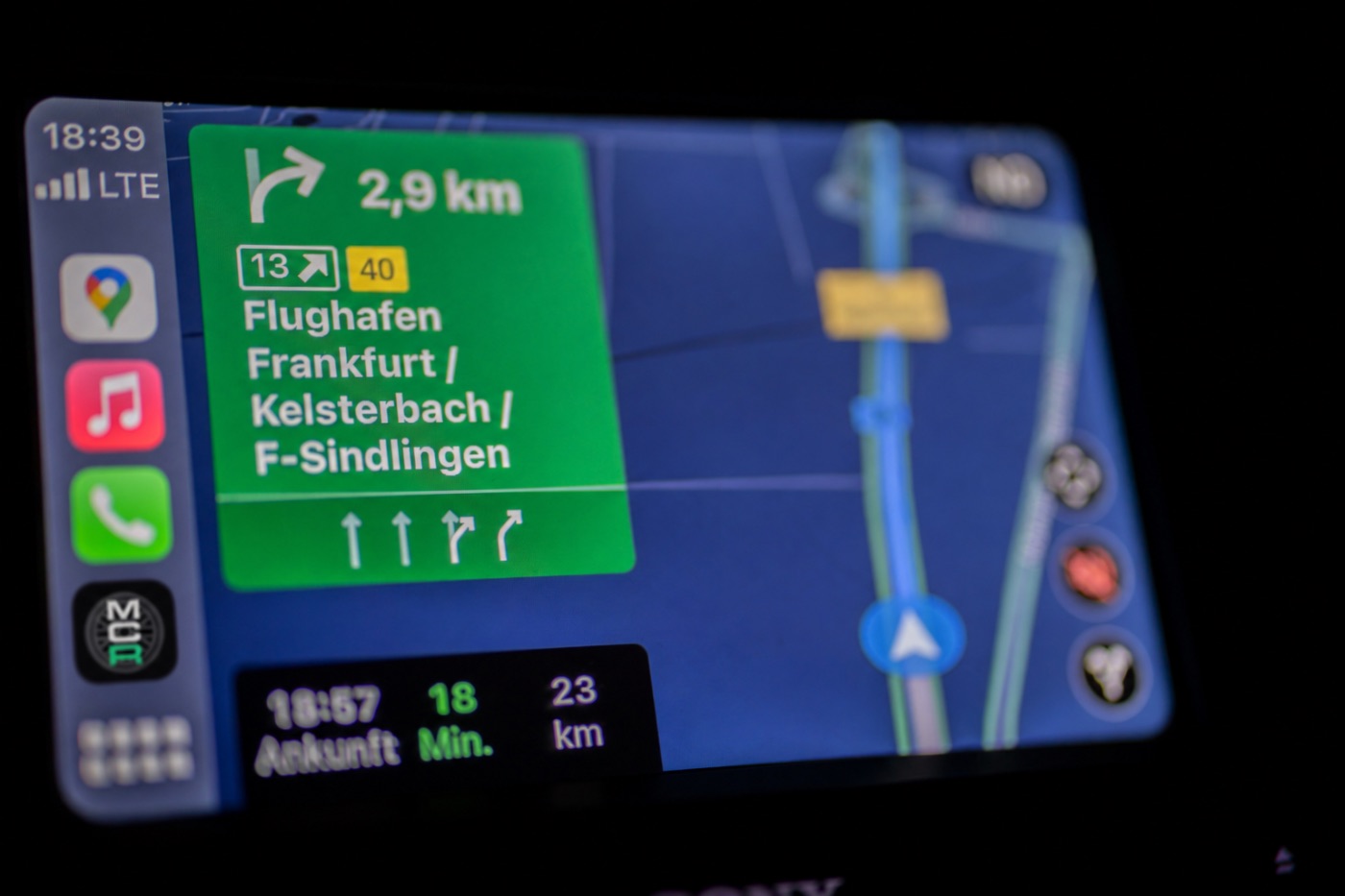My Car Radio icon on a CarPlay screen at night